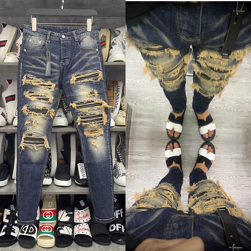 Quần jean bò nam Amiri skinny xanh đậm wash rách tua xù vàng dọc đùi vá da nhăn đen 4 cúc chữ QJ288P
