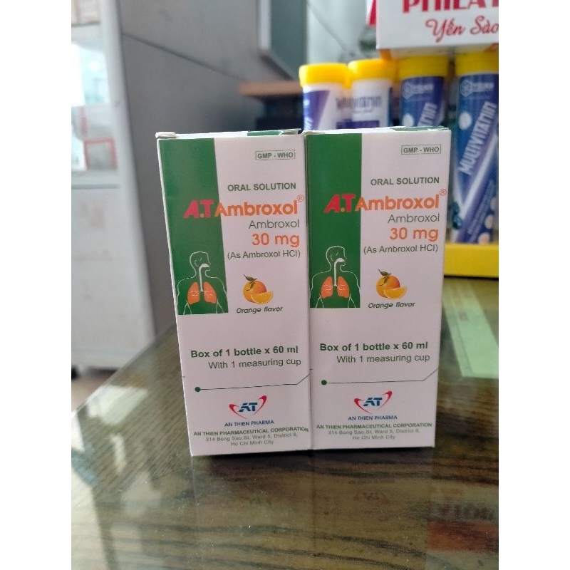 A.T Ambroxol sr chai 60ml , và ống ,vị cam , giúp long đờm, tiêu nhày