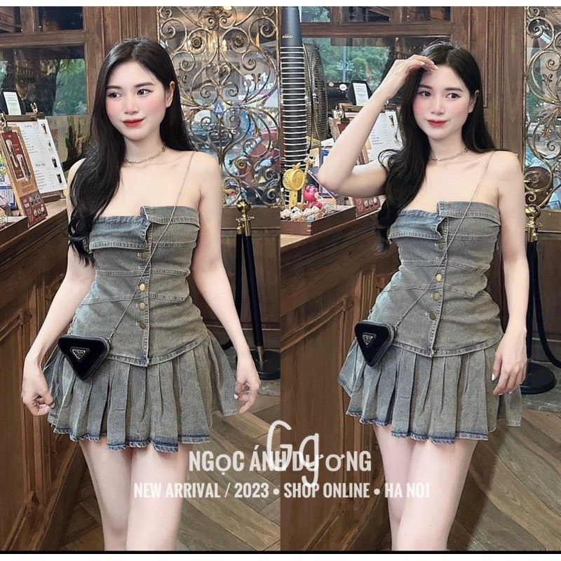 Set bộ đồ nữ áo cúp ngực bẻ vạt đính hàng nút cùng với chân váy chữ A xếp sang chảnh