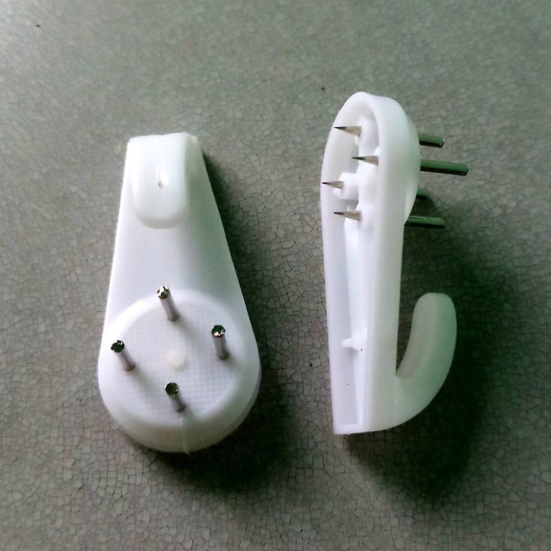 Đinh 4 chân  dùng để treo các loại đồng hồ treo tường và tranh trang trí Mộc Decor