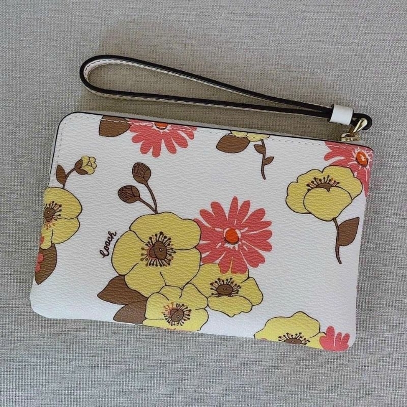 Ví C0ach cầm tay siêu sang