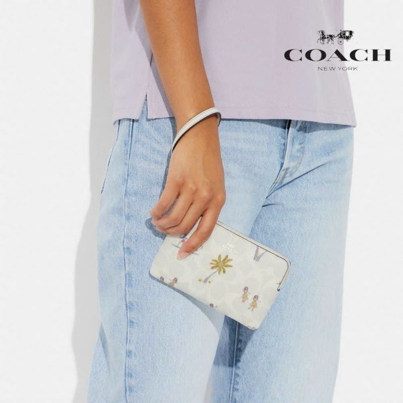 Ví C0ach cầm tay siêu sang