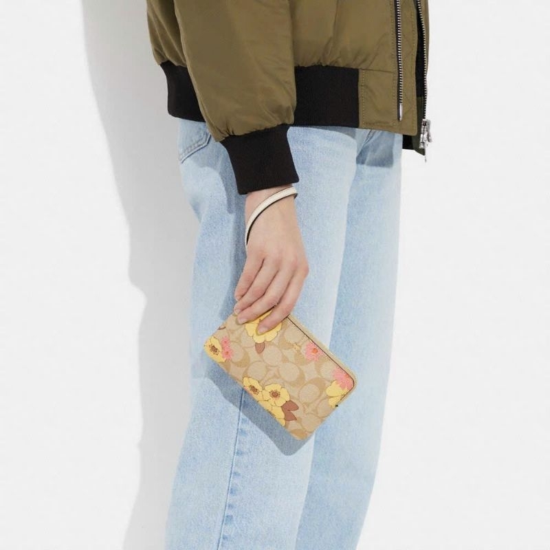 Ví C0ach cầm tay siêu sang