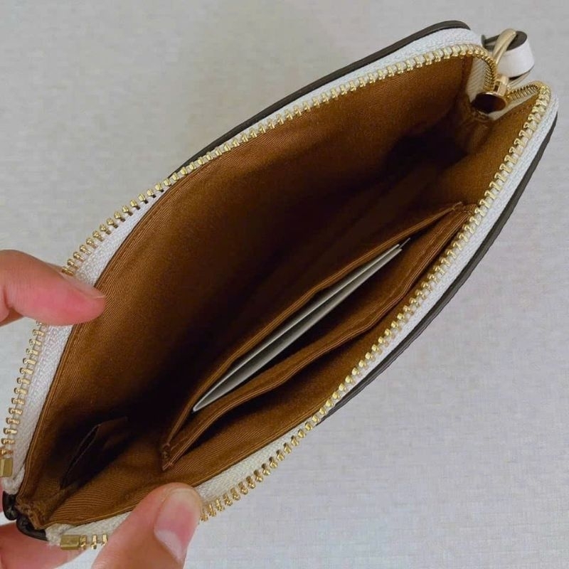 Ví C0ach cầm tay siêu sang