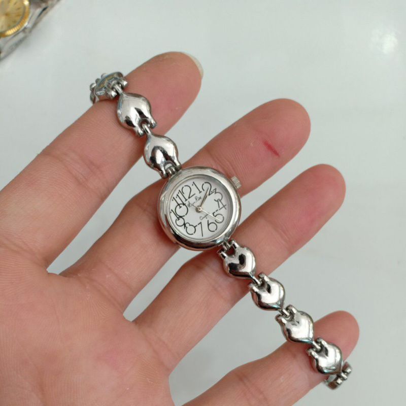 Đồng hồ si nữ hiệu SUN RISE dây tim màu bạc