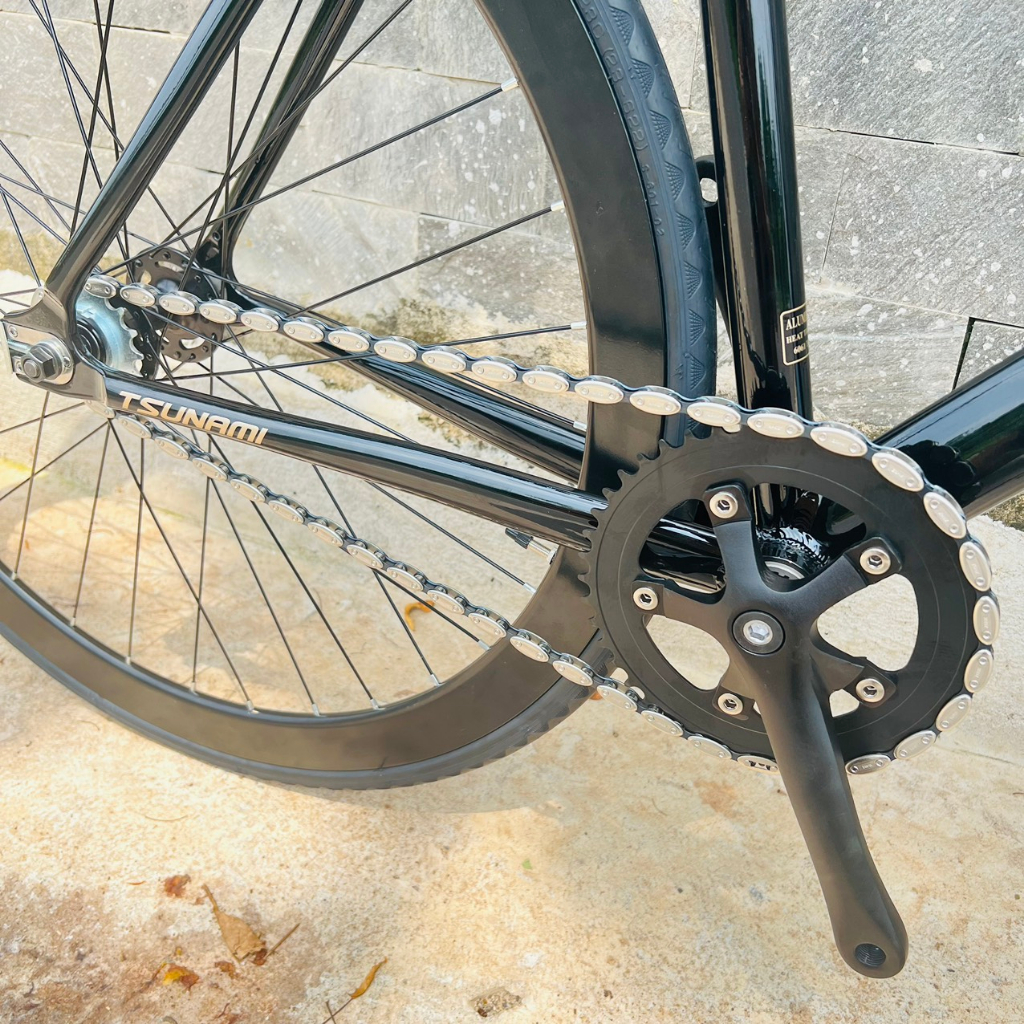 Xe đạp fixed gear TSUNAMI SNM100 cơ bản - Đen bóng chữ vàng