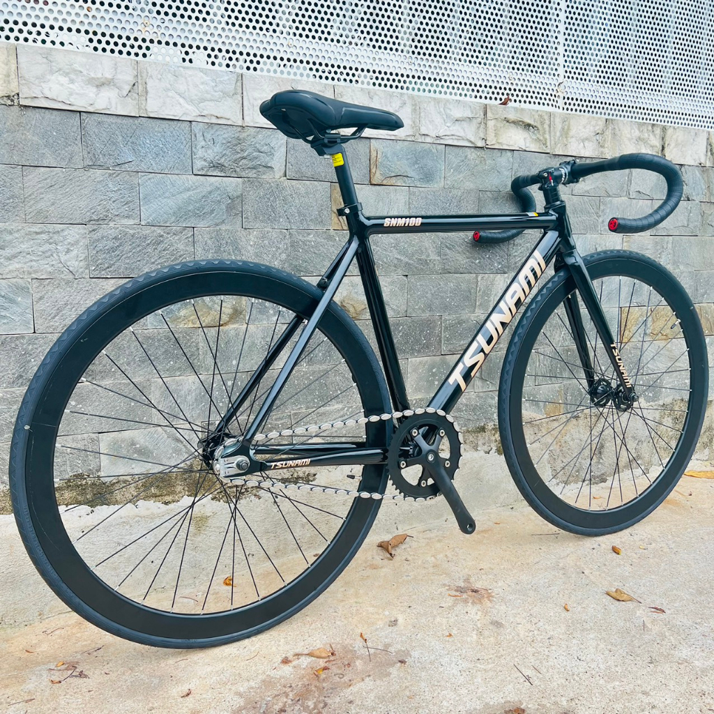 Xe đạp fixed gear TSUNAMI SNM100 cơ bản - Đen bóng chữ vàng