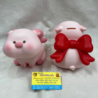Ống heo đất tiết kiệm heo nơ phún phín nhựa size nhỏ 20cm * 17cm