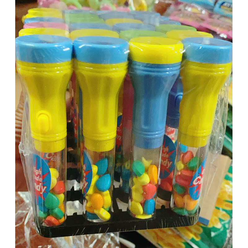 Vỉ 24 chiếc đèn pin chiếu hình kèm kẹo  trái cây