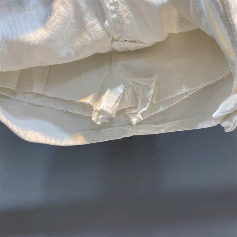 Quần váy túi kiểu