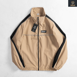 Áo khoác gió hidoli phối phản quang tay ngực thời trang