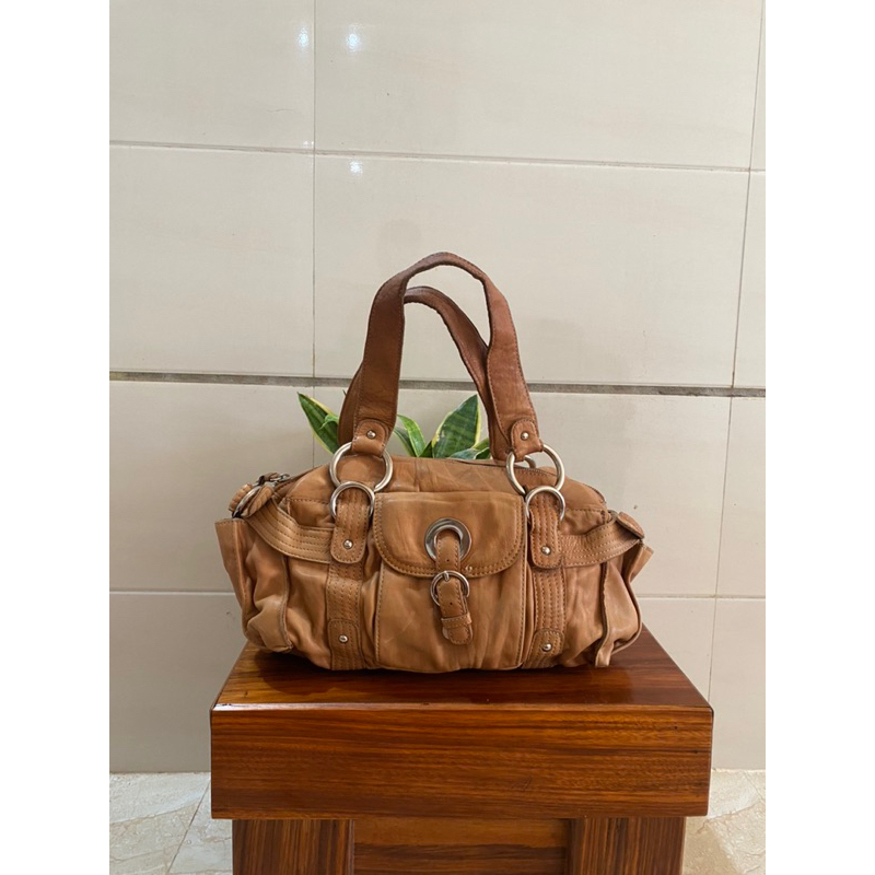 Túi si Mỹ da bò sáp