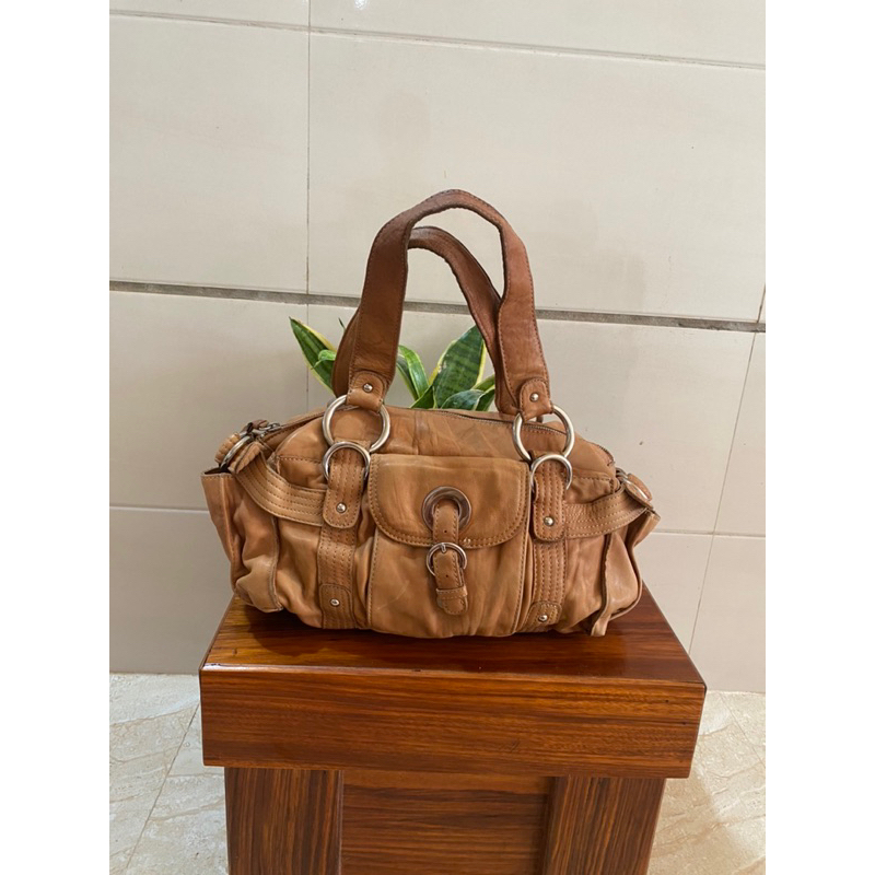 Túi si Mỹ da bò sáp