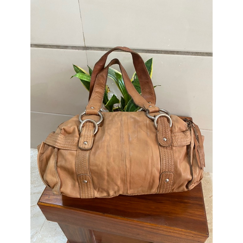 Túi si Mỹ da bò sáp