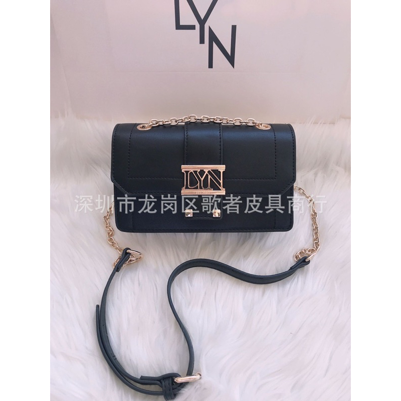 Túi đeo chéo LYN xuất dư da mềm khoá dập logo hãng