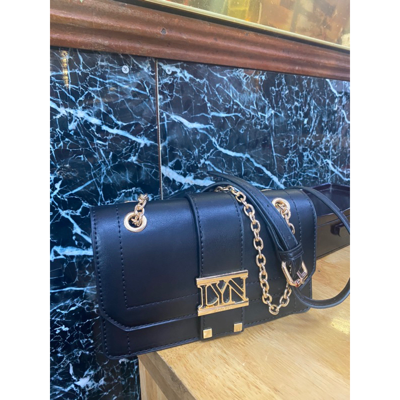 Túi đeo chéo LYN xuất dư da mềm khoá dập logo hãng