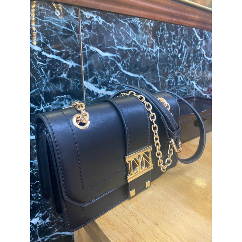 Túi đeo chéo LYN xuất dư da mềm khoá dập logo hãng