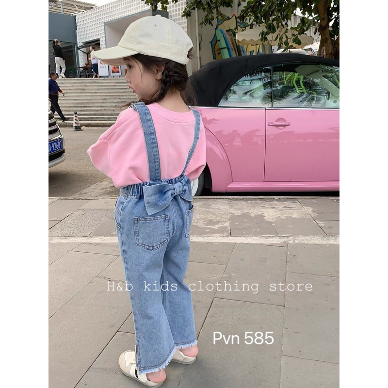 Yếm bò ống loe nơ lưng bé gái