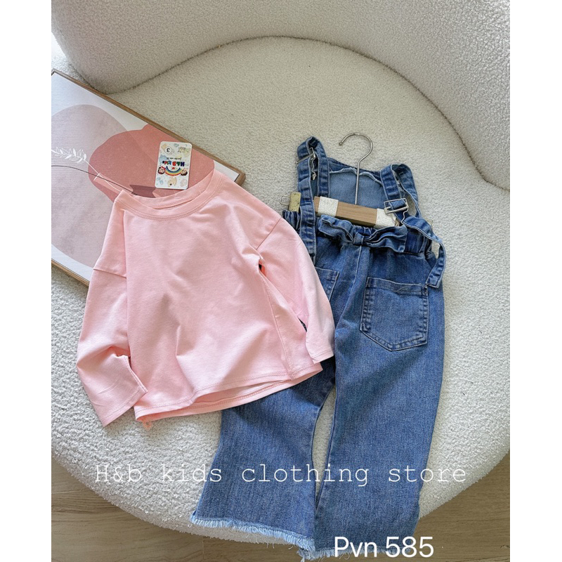 Yếm bò ống loe nơ lưng bé gái