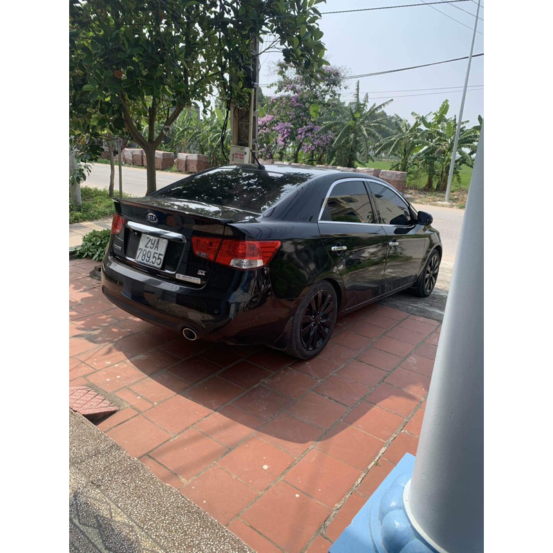 Đuôi gió liền cốp Kia Forte, Cerato 2009-2013 hàng mộc chưa sơn