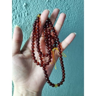 Chuỗi hổ phách huyet 108 hạt 6ly