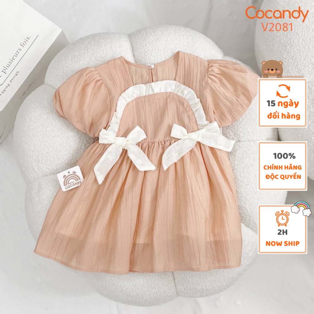 Váy cho bé -Váy cộc CAM HỒNG tay bồng 2 nơ BE cho bé của COCANDY mã V2081