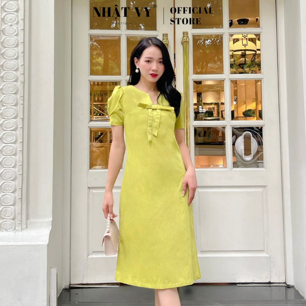 Đầm công sở Nhật Vy tay ngắn cổ V cách điệu đính nơ dáng suông chất thun tapta phù hợp đi chơi , cafe sang chảnh - D2497