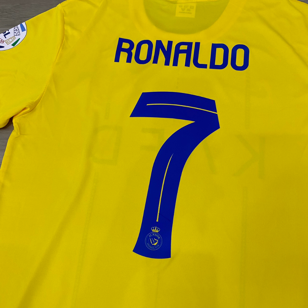 Bộ quần áo bóng đá Al Nassr màu vàng DK2024 in tên RONALDO số 7 - font mới