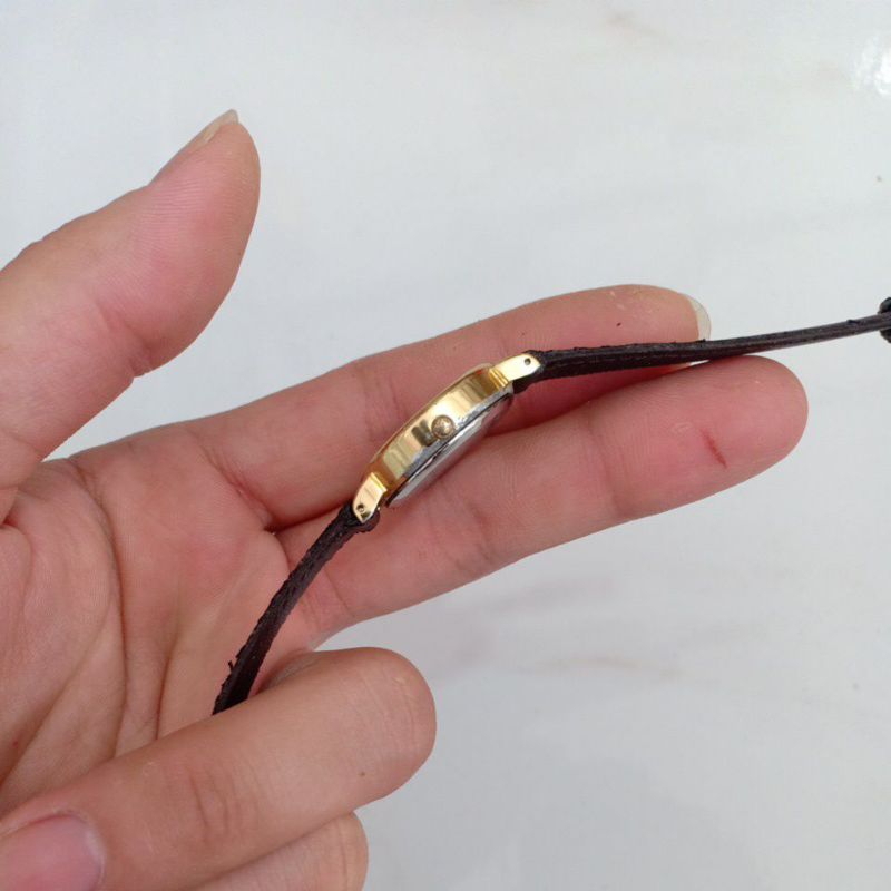 Đồng hồ si nhật nữ dây da hiệu ALBA mạ vàng