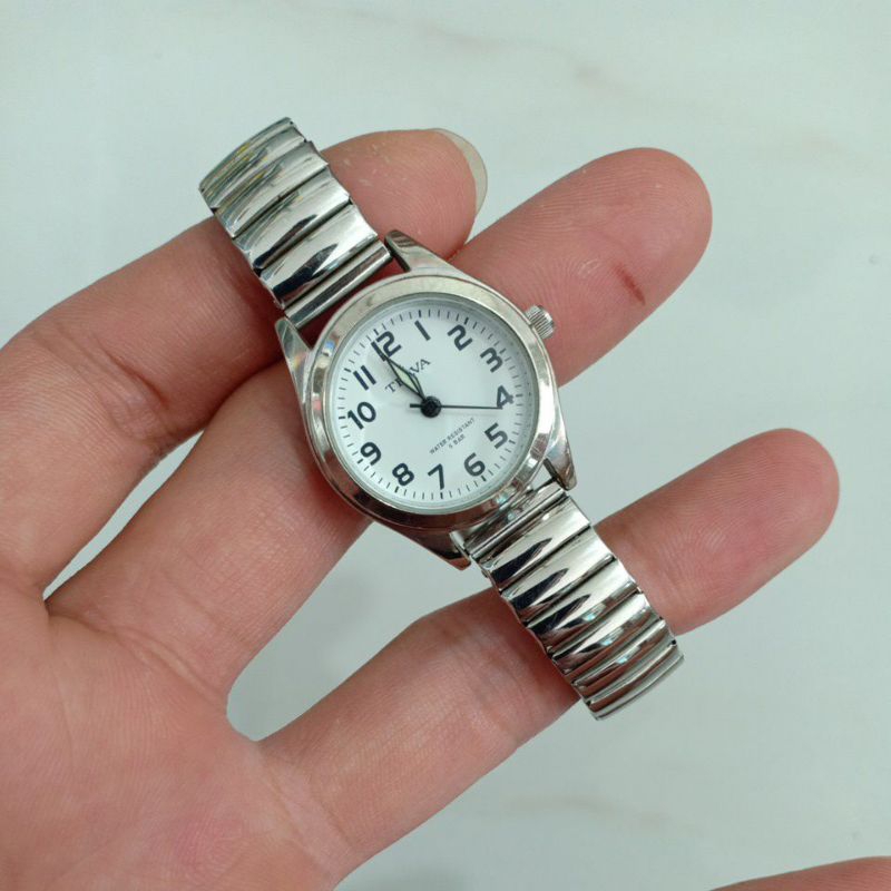 Đồng hồ si hiệu TELVA dây chun màu bạc