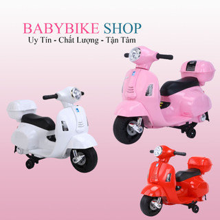 Xe máy điện vespa cho bé Q518 Xe máy điện cho bé gái có nhạc và đèn cốp để đồ.