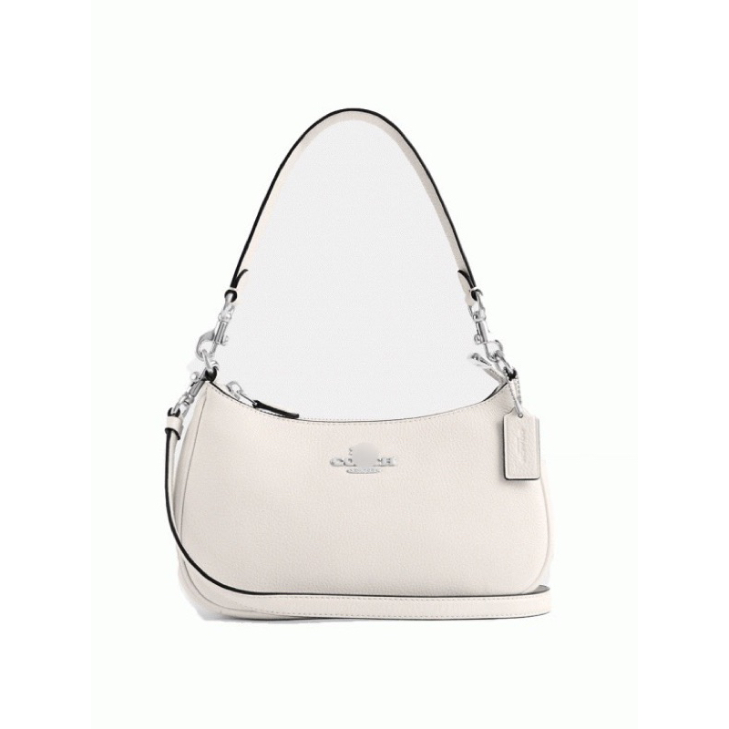 Túi coach teri màu trắng