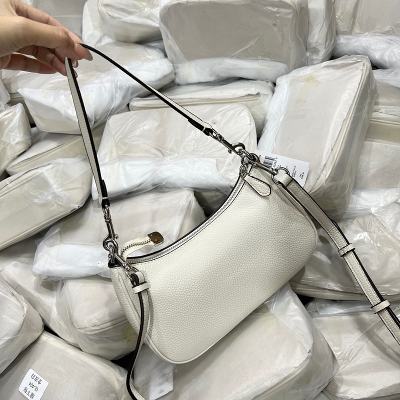 Túi coach teri màu trắng