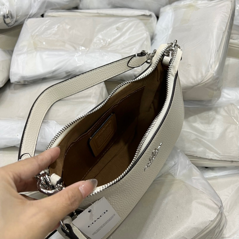 Túi coach teri màu trắng