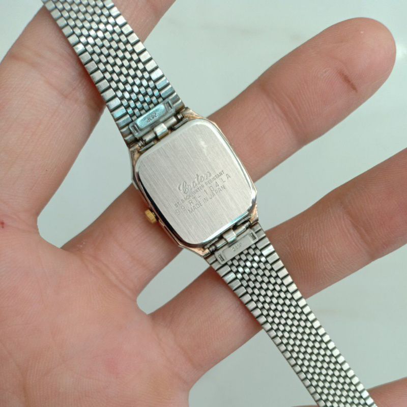 Đồng hồ si nhật nữ mặt tank vuông hiệu CROTON dây lụa mạ vàng 10k