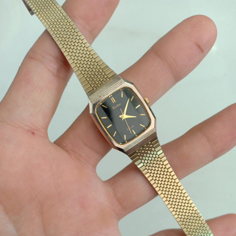 Đồng hồ si nhật nữ mặt tank vuông hiệu CROTON dây lụa mạ vàng 10k