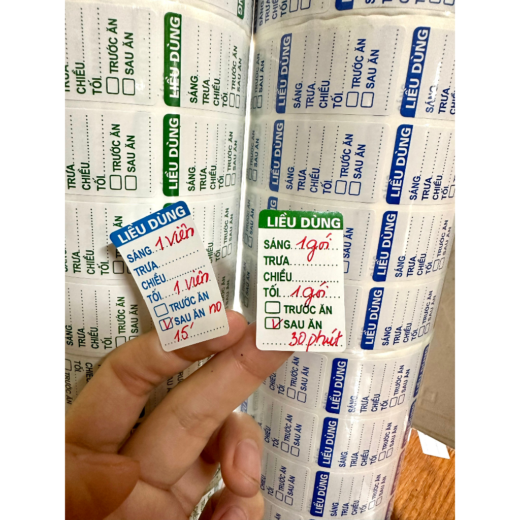 Tem chia liều màu xanh lá, xanh dương, Tem liều dùng cỡ 2.5 x 4 cm, cuộn 4300 tem in dọc offset