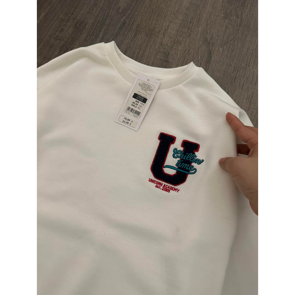 Váy C áo nỉ trắng chân váy kẻ