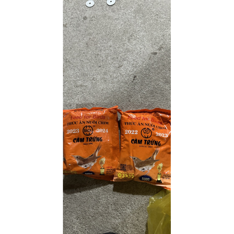 Cám trứng tổng hợp ba vì cho mọi loại chim dạng viên túi cam giúp chim căng lửa hót líu