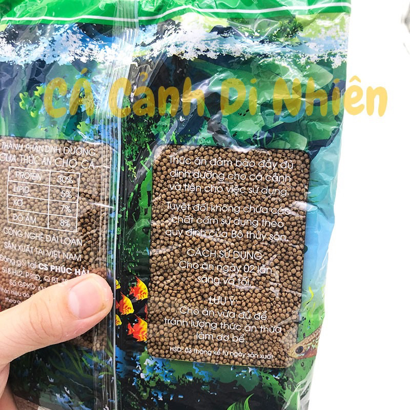 Cám cá Shanghai thức ăn cho cá dạng viên to 500g cung cấp dinh dưỡng nuôi cá khoẻ mạnh bơi tốt