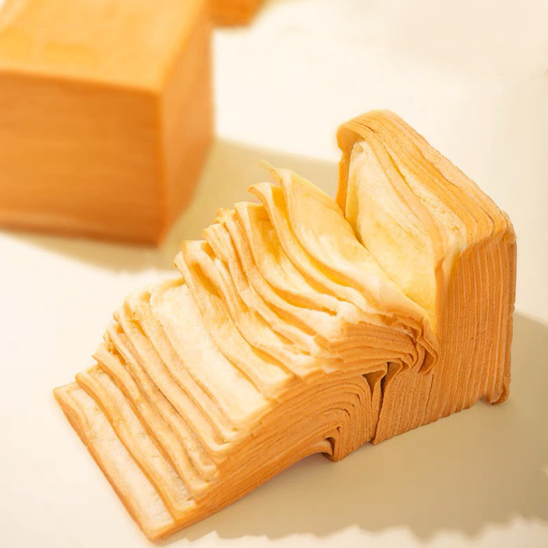 Bánh mì gối ngàn lớp mini Nhiên Lợi gói 80g