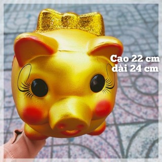 Heo đất tiết kiệm hình nơ vàng tài lộc sai lở