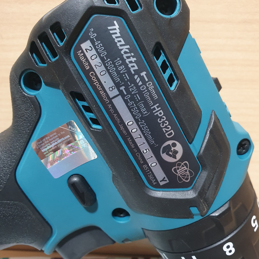 Máy khoan búa và vặn vít dùng pin Makita HP332DZ