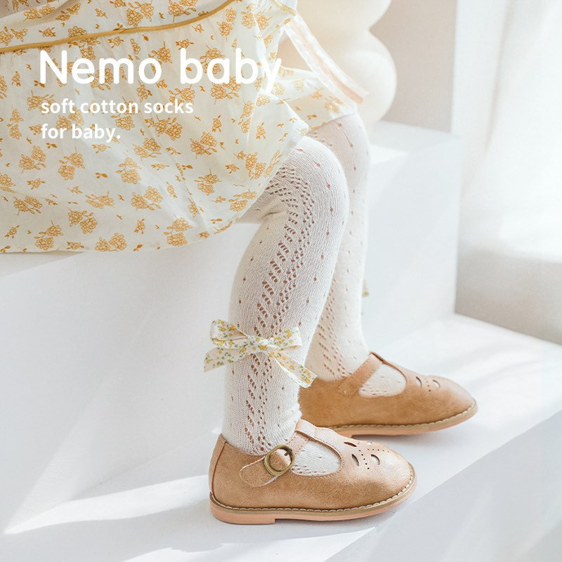 QUẦN TẤT XUẤT HÀN ĐÍNH NƠ BÉ GÁI