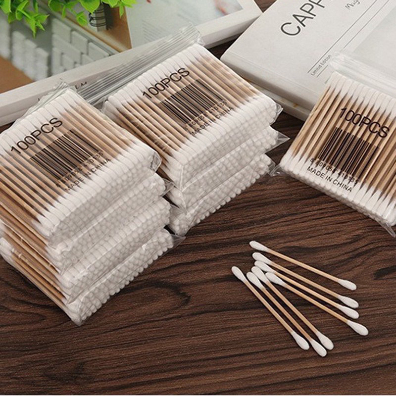 Tăm bông 100 que thân gỗ dùng ngoáy tai nặn mụn đầu đen