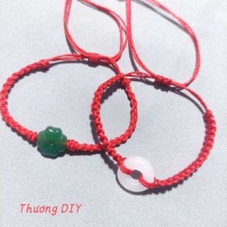 Vòng tay chỉ đỏ ngọc bội bình an cỏ bốn lá may mắn