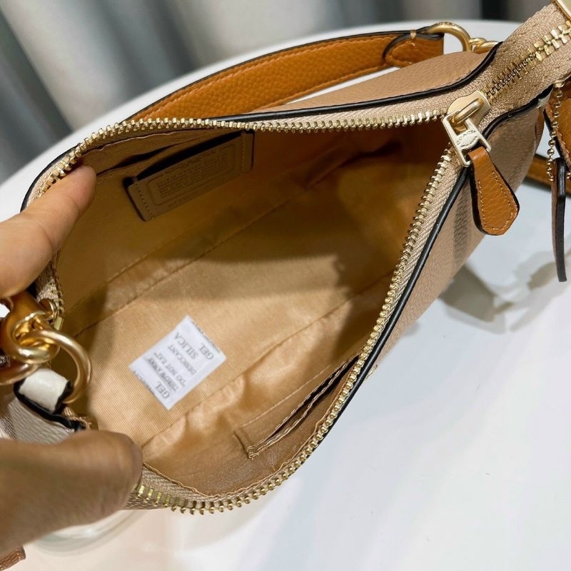 TÚI COACH TERI DÁNG THUYỀN