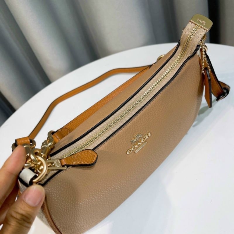 TÚI COACH TERI DÁNG THUYỀN