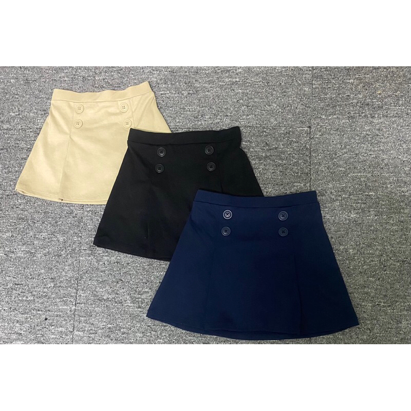 Chân váy ngắn học sinh bé gái kaki mềm 4 cúc 2-12Y