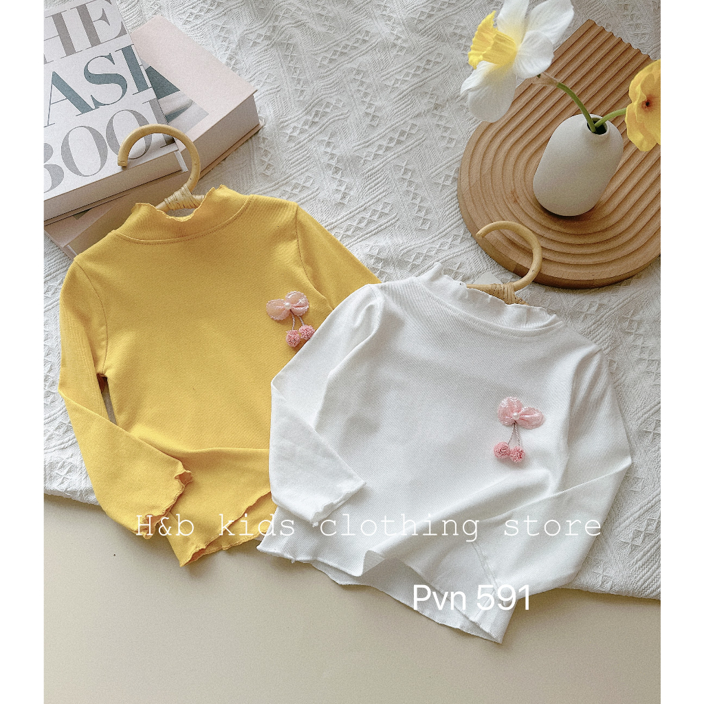 Áo zip cổ nhún gắn nơ bé gái